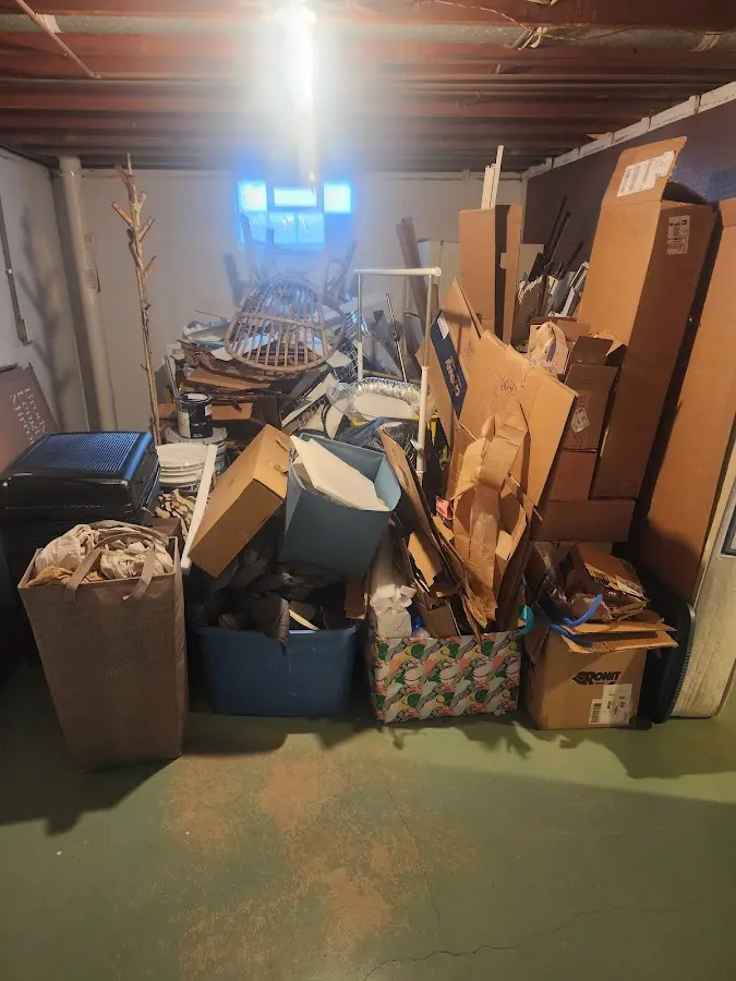 Roll-off dumpster container at job site for Yard Waste Dumpster Rental in Polson